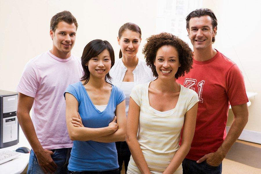 bigstock-Five-People-Standing-In-Comput-4132428